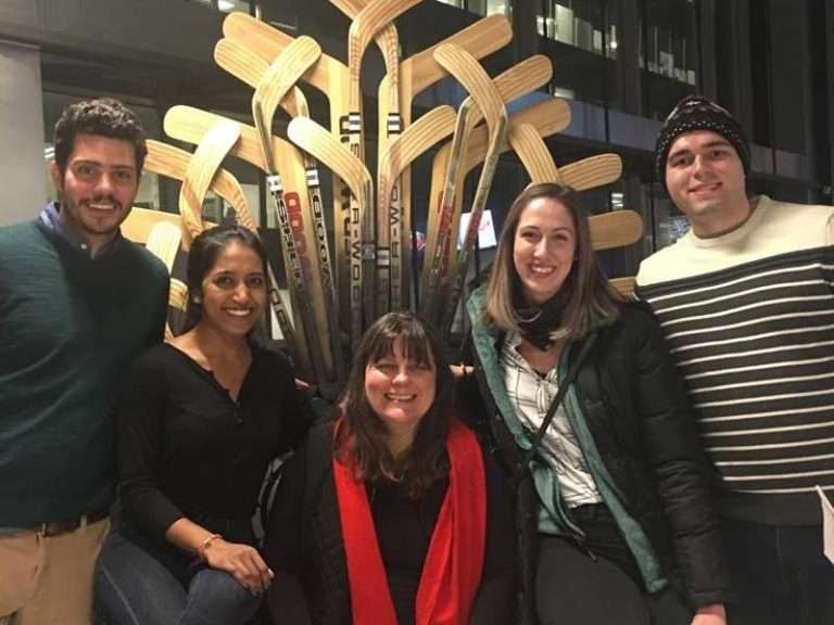 A group of MBA students standing for a group picture