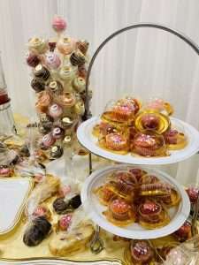 A setup of cupcakes on a table