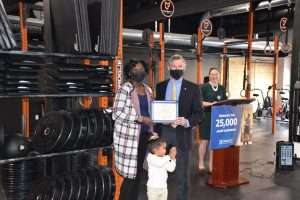 Founders of TheraV receiving an award at the EDGE grant event