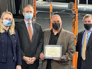Founders of Kindwell receiving an award at the EDGE grant event