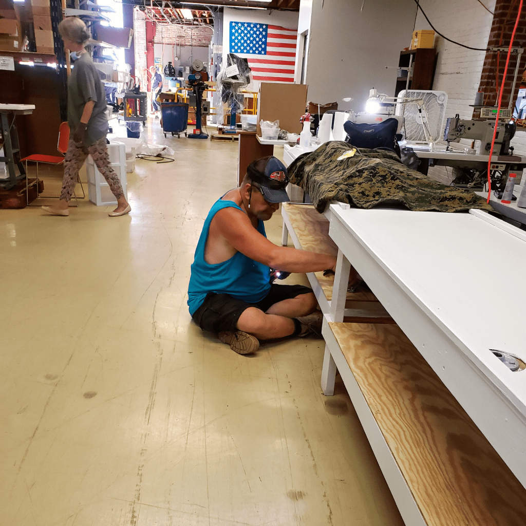 A volunteer working on a table