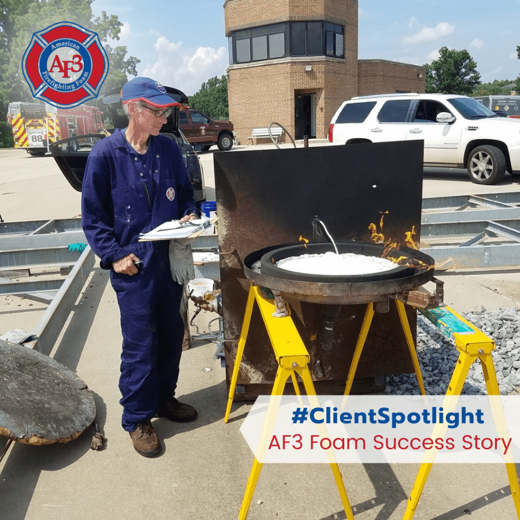 Delaware SBDC Client AF3 inspecting a firefighting foaming machine.