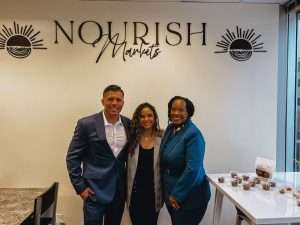Delaware SBDC Client Nourish Markets with SBDC advisor at the grand opening.