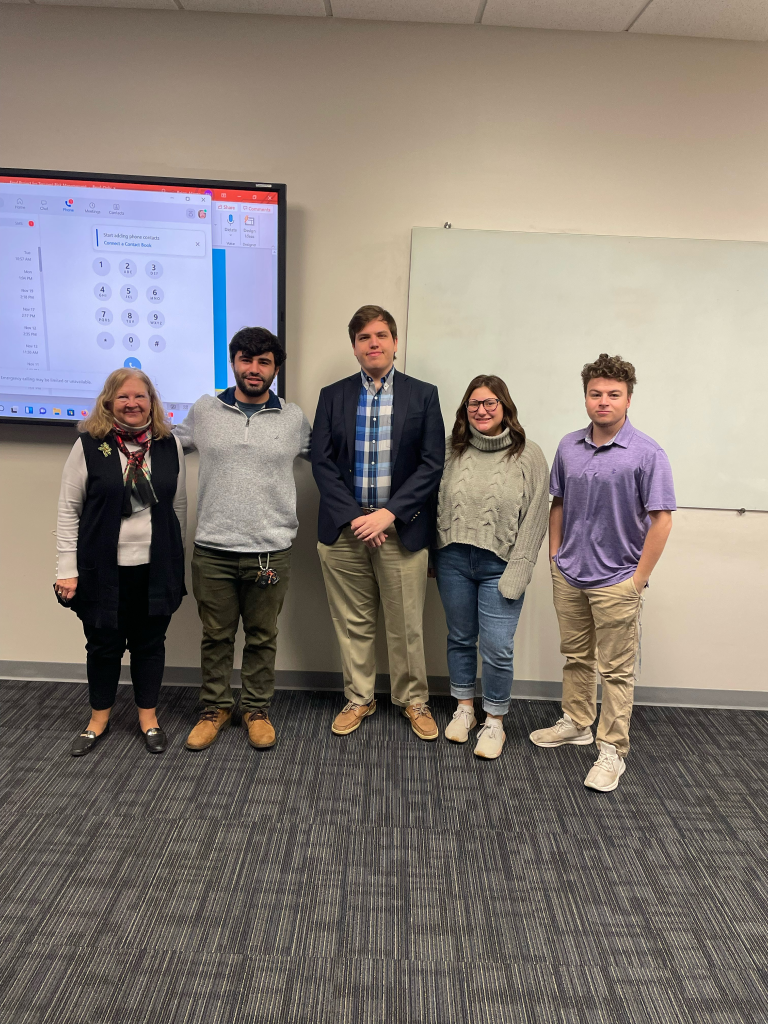 Delaware SBDC advisor standing in a classroom with students