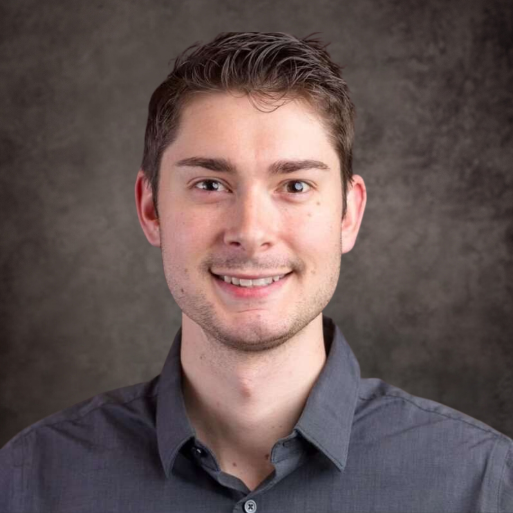 A professional headshot of a Delaware business advisor in business attire.